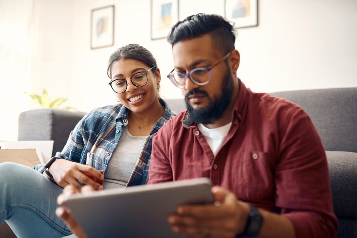 Young couple using a tablet